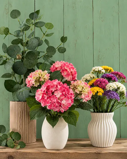 immagine ispirazionale su legno propostafiori artificiali per garden center